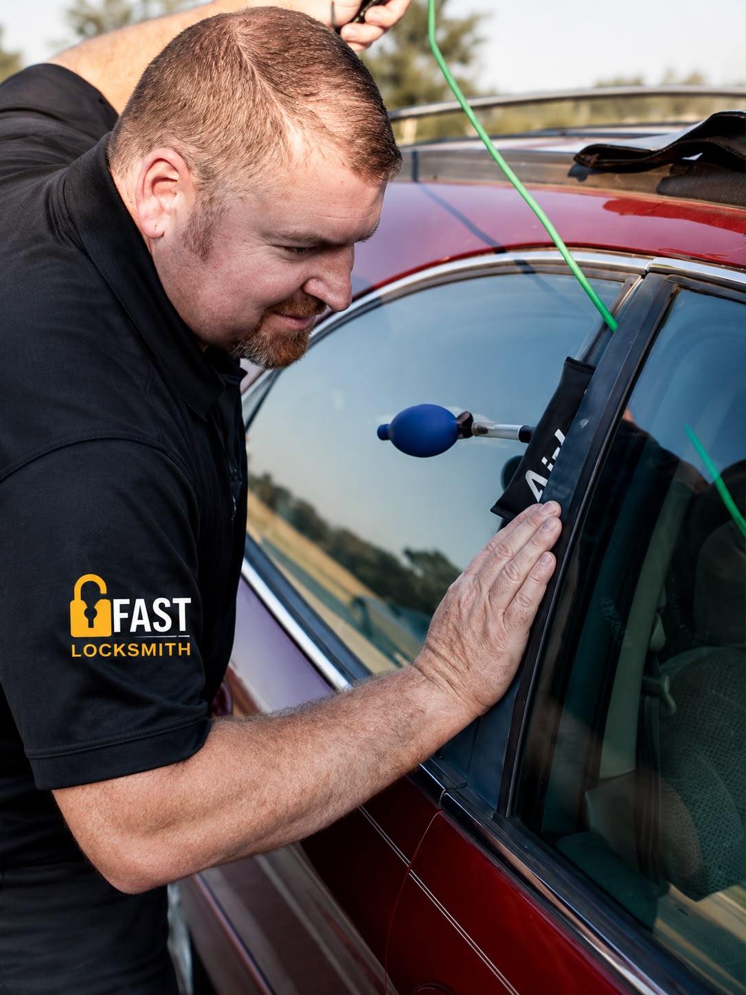 Fast Locksmith technician using professional car lockout tools